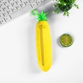 Cute pineapple-shaped silicone pencil case with yellow quilted texture and green leaf top - Pineapple Yellow