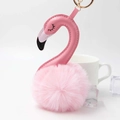 Pink flamingo keychain featuring a soft faux fur pompom and stylish faux leather neck - Light Pink