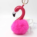 Close-up of pink faux fur flamingo keychain with soft texture and golden metal details - 8x15cm / Rose Red