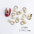 Golden nail charm with white pearl and iridescent rhinestones, size 7.7x13.3mm - Gold AB Rhinestone White Pearl Style (2081 Iridescent Pink)