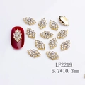 Golden alloy nail art charm with white zircon flower design, size 6.7x10.3mm - Golden Rhinestone Rhombus Cluster (2219)