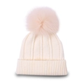 Detailed close-up of cream knit beanie featuring a large fluffy faux fur pom-pom topper - Off White