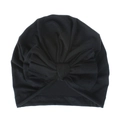 Detail of a black baby turban hat featuring a large soft knit cotton decorative bow - Black