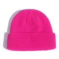 Classic bright pink knitted beanie hat with warm texture in a minimalist skull cap style - Rose Red