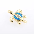 Close-up of a gold-plated turtle connector with blue opal and sparkling zircon stones - Gold Plated Blue Opal Turtle (Connector)