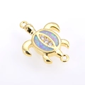 Detailed macro view of a gold turtle connector with colorful opal and zircon inlay - Gold Plated Pink Opal Turtle (Connector)