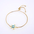 Macro detail of gold turtle bracelet featuring blue opal stone and adjustable box chain - Gold Plated Blue Opal Turtle Bracelet