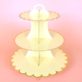Three-tier pale yellow cardboard cupcake stand with gold wavy edges and top handle - Yellow Scalloped Edge