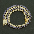 13mm gold Cuban link necklace with sparkling blue and white crystals on black background - Gold Blue Rhinestone