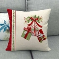 Linen Christmas pillowcase with red bow and gift boxes design on a sofa - Style 3