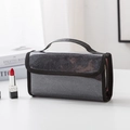 Sparkly black sequin waterproof makeup bag with durable handle and secure zipper closure - Black