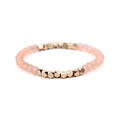 Pink faceted crystal beads bracelet with golden copper curved tube on white background - Orange