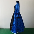 Detail of blue Victorian dress featuring black floral patterns and ruffled sleeves - S / Blue / Blue
