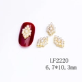 Golden diamond flower nail art charms with center pearls on burgundy fake nail - Golden Pearl Rhombus Style (2220)