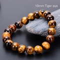 Handmade 10mm tiger eye beaded bracelet with natural fiber texture and golden cat-eye effect - Yellow Brown Tiger Eye / 10mm