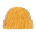 Classic yellow knit beanie cap featuring thick ribbed texture and rolled cuff design - Yellow