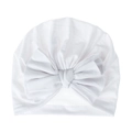 Detailed view of a white knitted cotton baby turban hat featuring a large soft bow accent - White