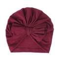 Dettaglio di un morbido cappello a turbante per neonati in cotone con grande fiocco - Borgogna
