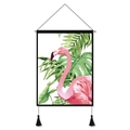 Pink flamingo wall hanging with tropical leaves, wooden frame and black tassels - Flamingo & Tropical Leaves