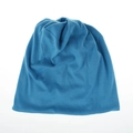 Close-up of blue knitted ponytail beanie fabric texture and elastic versatile headband design - Teal