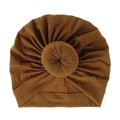 Close-up of a brown knitted rayon donut turban hat showing fabric texture and knot. - One Size / Caramel