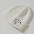 White knitted beanie for kids with black embroidered smiley face patch for winter - Core Spinning / White