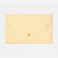 Cream pearlized paper envelope with wavy cloud edge and heart-shaped buckle closure - Pearlescent White Gold