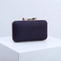 Sparkly purple sequin evening clutch bag with pleated texture and gold bow clasp - Deep purple