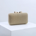 Champagne gold evening clutch with glitter texture and metallic bow-shaped clasp - Light gold