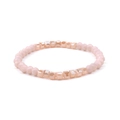 Elastic stretch bracelet featuring light pink faceted crystal beads and gold copper tube - Pink