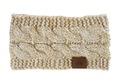 Macro detail of cable knit texture and leather brand label on warm winter headband - Camel and White
