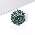 Vintage bronze round brooch featuring blue rhinestones and filigree design on white background - Round Filigree - Blue Rhinestone (XD635-4)