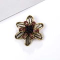 Floral alloy brooch in bronze finish featuring purple rhinestones on a white card - Hollow Petals - Pink Purple Rhinestone (XD5376-1)