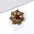 Vintage bronze flower brooch with deep red and amber rhinestones on a white background - Dark Red Rhinestone - Hollow Bronze (XD5454-2)