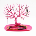 Rose red deer antler jewelry stand for necklaces and earrings on a white background - Rose Red