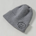 Kids grey ribbed knit beanie with a cute black embroidered smiley face on the cuff - Core Spinning / Gray