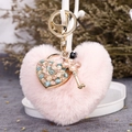 Pink heart-shaped plush keychain with cat eye stone pendant and gold metal ring - Pink