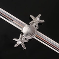 Detail of starfish and shell hair clip with pearls and rhinestones on black background - Starfish Shell 3-Piece Set / Silver