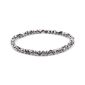 Dark grey faceted bead stretch bracelet with gold-tone copper tube accent on white base - Metallic Grey