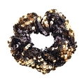 Detail of a round elastic hair tie covered in sparkling gold and black mermaid sequins - Gold Black