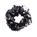 Close-up of two-tone black and silver reversible sequin hair scrunchie with shiny texture - Black Silver