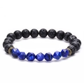Detailed shot of faceted blue tiger eye beads and black lava rock beaded bracelet - Faceted Lapis Lazuli Style