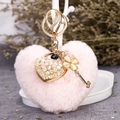 Pink plush heart keychain with gold-tone clover charm and pearl inlay heart pendant - Pink and White