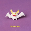 Macro view of cartoon bat resin charm with size 7 specification on purple background - Style 7 White Bat