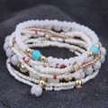 Bohemian multi-layer stretch beaded bracelet set with white resin and marble-style beads - White