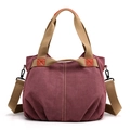 Retro burgundy canvas tote bag with khaki straps and orange leather trim detail - Purple and Coffee