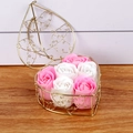 Detail of pink and white soap rose flowers in a heart-shaped golden wire gift basket - Pink + White