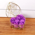 Detail of purple soap roses inside a heart-shaped golden wire basket for gifting - Purple