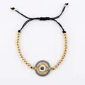 Adjustable evil eye charm bracelet with gold beads and sparkling micro-paved zircons - Black Cord Evil Eye