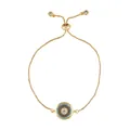 Detail view of gold evil eye bracelet with colorful pavé cubic zirconia and slide clasp - Gold/Concentric Micro-pave Eye
